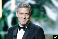 U.S. actor George Clooney speaks on stage prior to receiving an Honorary Cesar award during the ceremony of 42nd Cesar Film Awards, at the Salle Pleyel, in Paris, France, Feb. 24, 2017.