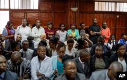 Members of the public fill the courtroom as the High Court in Kenya begins hearing arguments in a case challenging parts of the penal code seen as targeting the lesbian, gay, bisexual and transgender communities, at the High Court in Nairobi, Kenya, Feb.22, 2019.