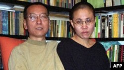 Ovogodišnji dobitnik Nobelove nagrade za mir, kineski disident Liu Šiaobo, sa suprugom Liu Šia