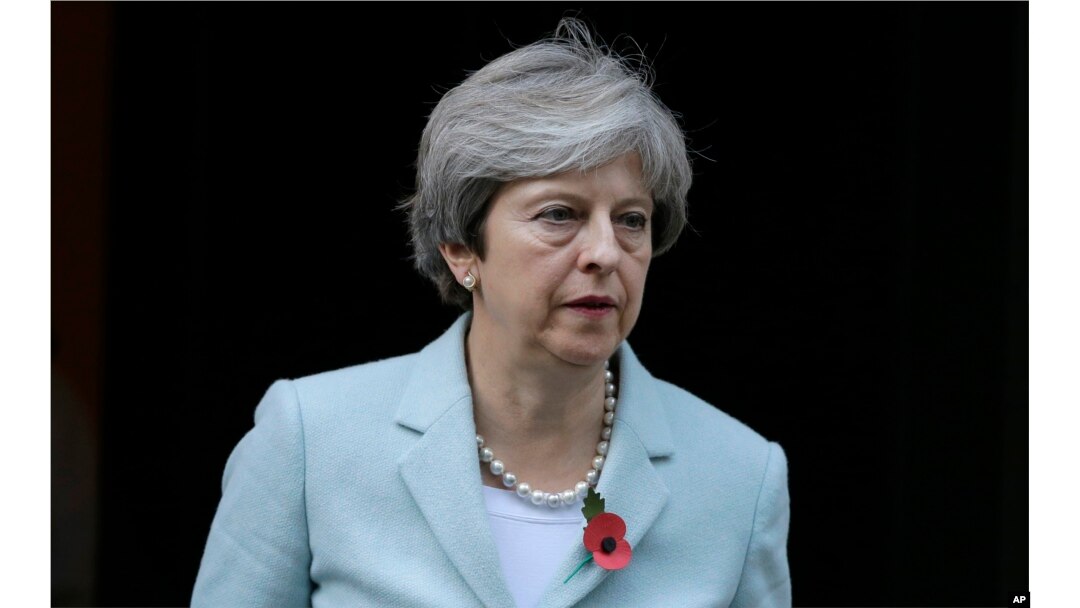 Britain's Prime Minister Theresa May leaves 10 Downing Street for the House of Commons in Parliament in London, Monday, Oct. 30, 2017.