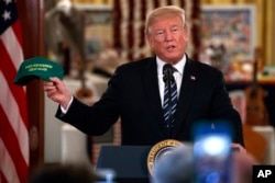 President Donald Trump speaks during a "Made in America Product Showcase" at the White House, July 23, 2018.