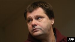 FILE - Imprisoned Belgian serial rapist and murderer Frank Van Den Bleeken attends a hearing to determine if he will be allowed to be euthanised at the Court of Brussels. 