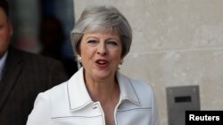 Theresa May, quittant la BBC après une interview, Londres, Grande Bretagne, le 15 juillet 2018.
