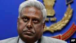 FILE - India's newly elected Central Bureau of Investigation (CBI) Director Ranjit Sinha addresses a press conference at its headquarters in New Delhi, India.