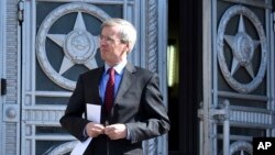 British Ambassador to Russia Laurie Bristow leaves after a meeting at the Russian Foreign Ministry building in Moscow, March 30, 2018. 