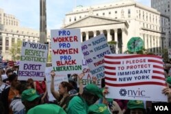 Protesters take to the streets on May Day in New York to protest U.S. President Donald Trump's immigration policies. (R. Taylor/VOA