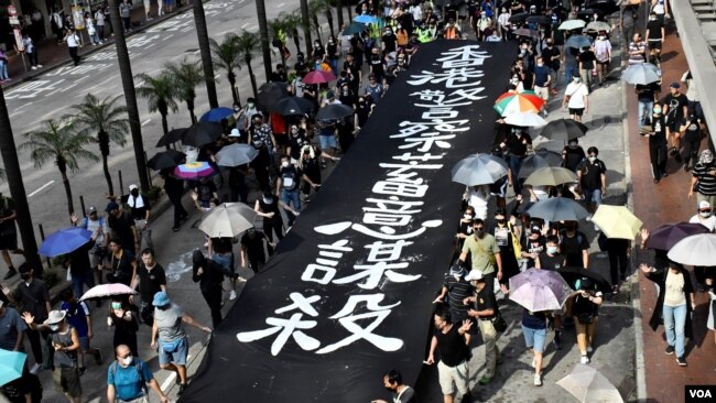 禁蒙面法10月5日生效 香港各地抗议继续