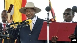 Ugandan President Yoweri Museveni is sworn in for another term at Kololo Airstrip in the capital city Kampala, May 12, 2011