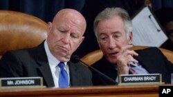 House Ways and Means Committee Chairman Rep. Kevin Brady, R-Texas (left) listens to Rep. Richard Neal, D-Mass., on Capitol Hill in Washington, March 8, 2017, as the committee began markup of the long-awaited plan by Republicans to repeal and replace the A