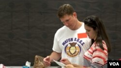 Adam Mehmud is a volunteer at his son's school through the Watch D.O.G.S. group.