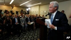 Marc Kasowitz personal attorney of President Donald Trump, leaves a packed room at the National Press Club in Washington, June 8, 2017 after delivering a statement following the congressional testimony of former FBI Director James Comey.