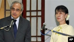 UN special adviser Vijay Nambiar (L) speaks during a news conference following his meeting with Burma's pro-democracy leader Aung San Suu Kyi, at her home in Rangoon, Burma, February 16, 2012.