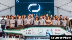 The Delft University of Technology team poses with its winning vehicle that took part in the Hyperloop competition held by SpaceX found Elon Must in Los Angeles. (Courtesy: Delft Hyperloop)