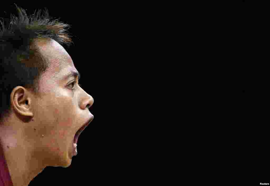 Indonesia's Jadi Setiadi prepares to lift on the 56Kg Group B weightlifting competition at the London 2012 Olympic Games July 29, 2012. 