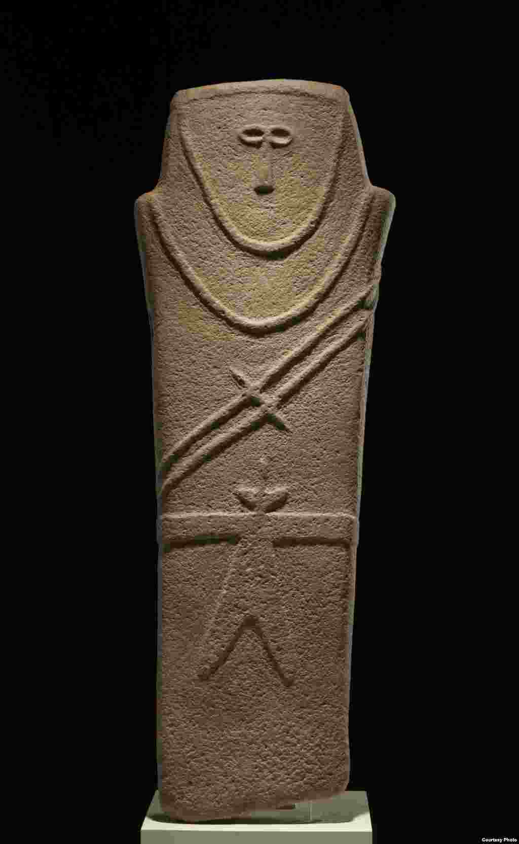 This anthropomorphic stele dates back to some 6,000 years ago and was probably associated with religious or burial practices.(Freer Sackler Galleries/Smithsonian Museum) 