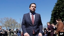 FILE - Rep. Devin Nunes, R-Calif leaves after speaking with reporters outside White House in Washington.