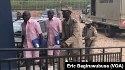 (i Buryo)Laforge Fils Bazeye (i Bumoso) Col Abega baherekejwe n'abacungagereza