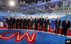 FILE - Republican presidential candidates take the stage during the CNN Republican presidential debate at the Ronald Reagan Presidential Library and Museum in Simi Valley, California, Sept. 16, 2015.