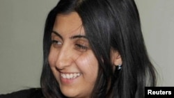 Yara Abbas, a reporter for the al-Ikhbariya news channel, is seen in this undated handout photo distributed to Reuters by Syria's National News Agency SANA on May 27, 2013. 