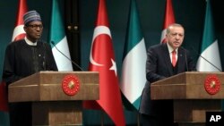 Turkey's President Recep Tayyip Erdogan, right, and Nigeria's President Muhammadu Buhari speak during a joint news conference at the presidential palace in Ankara, Turkey, Oct. 19, 2017.