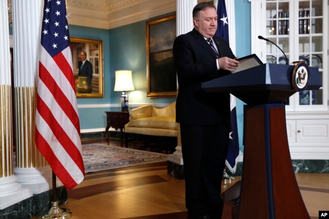 FILE - Secretary of State Mike Pompeo finishes speaking about refugees as he makes a statement to reporters at the State Department in Washington, Sept. 17, 2018.