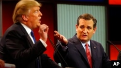 Republican presidential candidates, businessman Donald Trump and Sen. Ted Cruz, R-Texas, argue a point during a Republican presidential primary debate at Fox Theatre, Thursday, March 3, 2016.