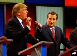 FILE - Republican presidential candidates, businessman Donald Trump and Sen. Ted Cruz, R-Texas, argue a point during a Republican presidential primary debate at Fox Theatre, Thursday, March 3, 2016. Republican presidential candidates, businessman Donald Trump and Sen. Ted Cruz, R-Texas, argue a point during a Republican presidential primary debate at Fox Theatre, March 3, 2016.
