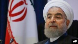 Iran's President Hassan Rouhani listens to a news conference during his visit for the United Nations General Assembly, Sept. 20, 2017, in New York.