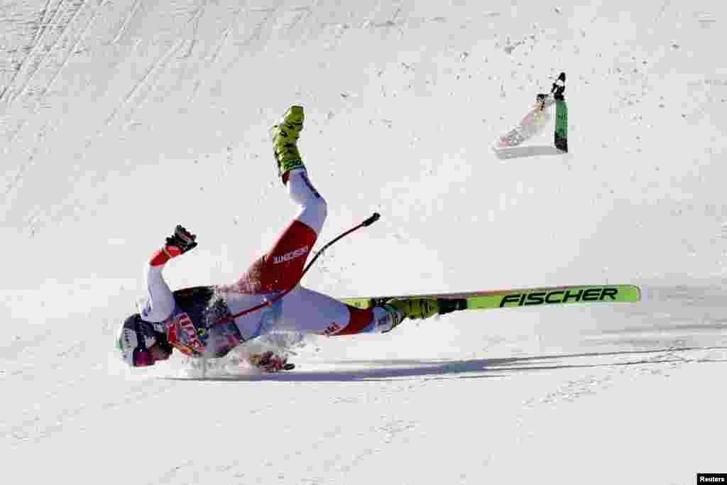 Switzerland&#39;s Urs Kryenbuehl crashes at the finish line during an alpine ski, men&#39;s World Cup downhill in Kitzb&#252;hel, Austria.