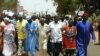 FILE - Protesters are seen in this April 16, 2016 in Banjul following the death of an opposition figure. 