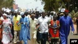 FILE - Protesters are seen in this April 16, 2016 in Banjul following the death of an opposition figure. 