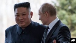 Ким Чен Ын и Владимир Путин 