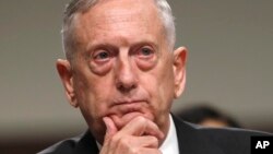 Defense Secretary Jim Mattis listens while testifying on Capitol Hill in Washington, June 13, 2017, before a Senate Armed Services Committee hearing on the defense department's budget. 