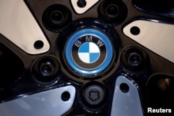 FILE PHOTO: The BMW logo is seen on the wheel of a vehicle presented at the Auto China 2016 auto show in Beijing, April 29, 2016.