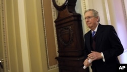 Senate Minority Leader Mitch McConnell of Ky. walks to the Senate floor on Capitol Hill in Washington, Thursday, Dec. 27, 2012.