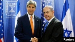 FILE - U.S. Secretary of State John Kerry meets with Israeli Prime Minister Benjamin Netanyahu in Tel Aviv, July 23, 2014.
