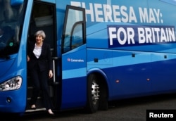 Britain's Prime Minister Theresa May arrives for a campaign visit to a tool factory in Kelso, Scotland, June 5, 2017.