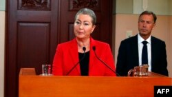 Kaci Kullmann Five, head of the Norwegian Nobel Committee, announces the winner of 2015 Nobel peace prize during a press conference in Oslo, Norway, Oct. 9, 2015. 