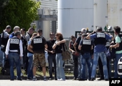 French police secure the entrance of the Air Products company in Saint-Quentin-Fallavier, near Lyon, central eastern France, on June 26, 2015.