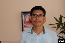 A former reporter for Radio Free Asia, Yeang Sothearin, 36 who is charged with “espionage” talked to VOA in his home in Phnom Penh about his life living on bail on April 17, 2019. (Phorn Bopha/VOA)