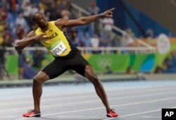 FILE - Usain Bolt celebrates winning the gold medal in the men's 200-meter final at the Summer Olympics in Rio de Janeiro, Brazil, Aug. 18, 2016.