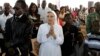 Christian worshippers pray during Christmas mass at a Church in Khartoum, Sudan, Dec. 25, 2013. 