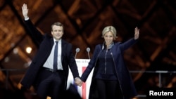 French President elect Emmanuel Macron and his wife Brigitte Trogneux