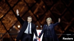 French President elect Emmanuel Macron and his wife Brigitte Trogneux