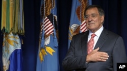 Defense Secretary Leon Panetta during the National Anthem at the start of an event at the Pentagon, Friday, Sept. 9, 2011.