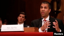 FILE - Ajit Pai, chairman of the Federal Communications Commission, testifies before a Senate Appropriations subcommittee on Capitol Hill in Washington, June 20, 2017.