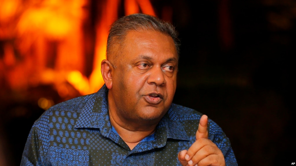 Sri Lankan Foreign Minister Mangala Samaraweera gestures as he speaks to foreign correspondents at his residence in Colombo, Sri Lanka, Feb. 7, 2017.