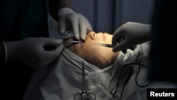 In this 2011 file photo, a Chinese woman undergoes a double eyelid surgery. (REUTERS)