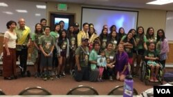 Cambodian-Americans who volunteer to teach Cambodian adoptees about Cambodian cultures take group picture before the end of the Cambodian Heritage Camp at Snow Mountain Range, Colorado in July 2017. (Poch Reasey/VOA Khmer)