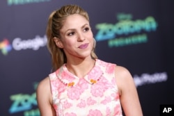 FILE - Shakira attends the L.A. premiere of "Zootopia," held at El Capitan Theatre in Los Angeles, Feb. 17, 2016.